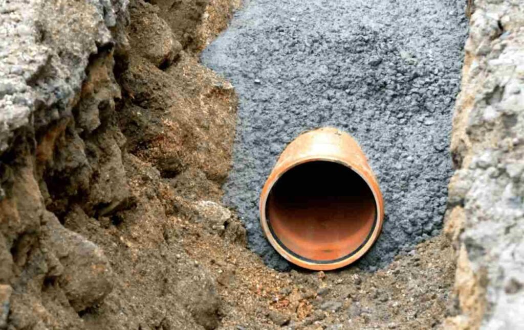 What maintenance tasks are involved in keeping a drainage system working properly?